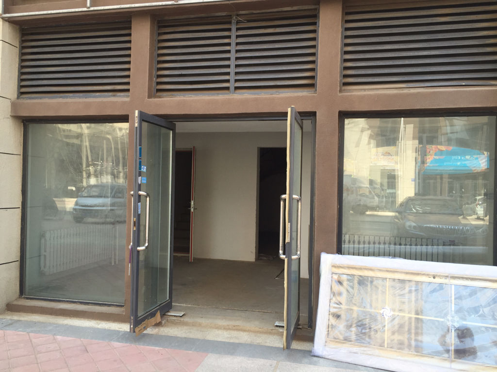 求指教 收银台放哪里好?店铺座南朝北 开间大但进深短
